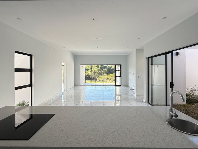 Modern 4-Bedroom Home in Palm Lakes Estate – Contemporary Living in a Natural Setting - Photo 5
