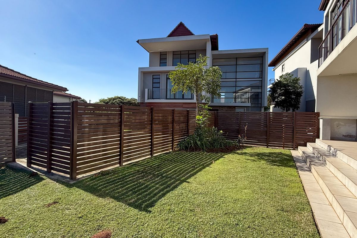 Modern Living – Stylish 5-Bedroom, 4.5-Bathroom Home Across 3 Levels - Photo 2