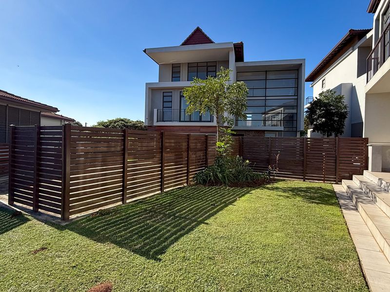 Modern Living – Stylish 5-Bedroom, 4.5-Bathroom Home Across 3 Levels - Photo 2