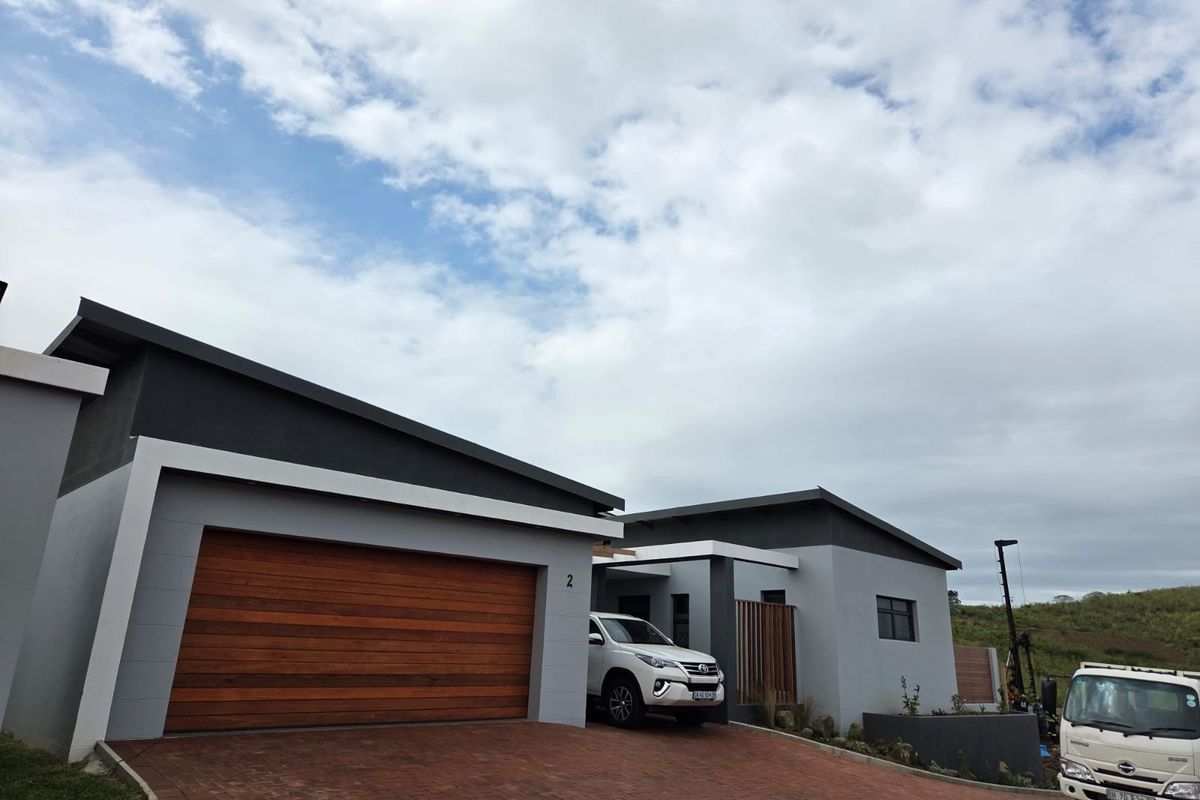 Welcome to Palm Orion – Your Modern Coastal Haven - Photo 2