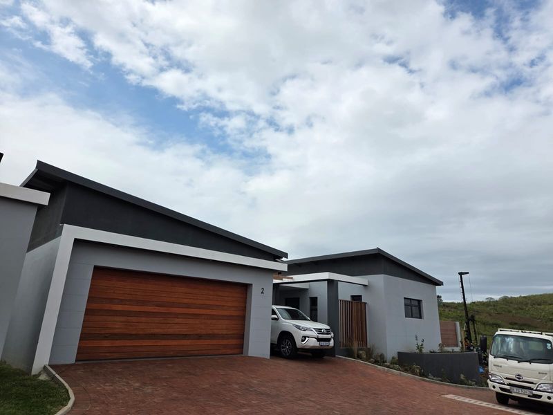 Welcome to Palm Orion – Your Modern Coastal Haven - Photo 2