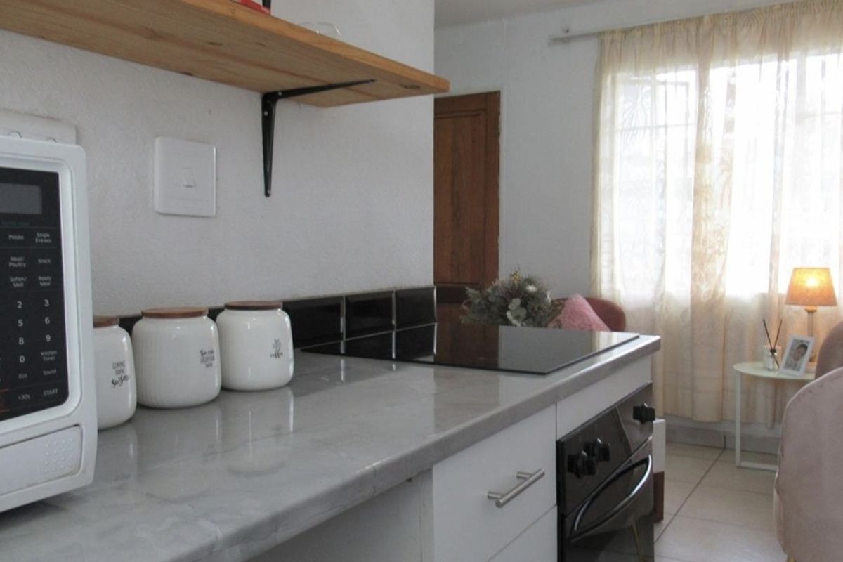 AFFORDABLE STARTER OR INVESTMENT UNIT - Photo 3