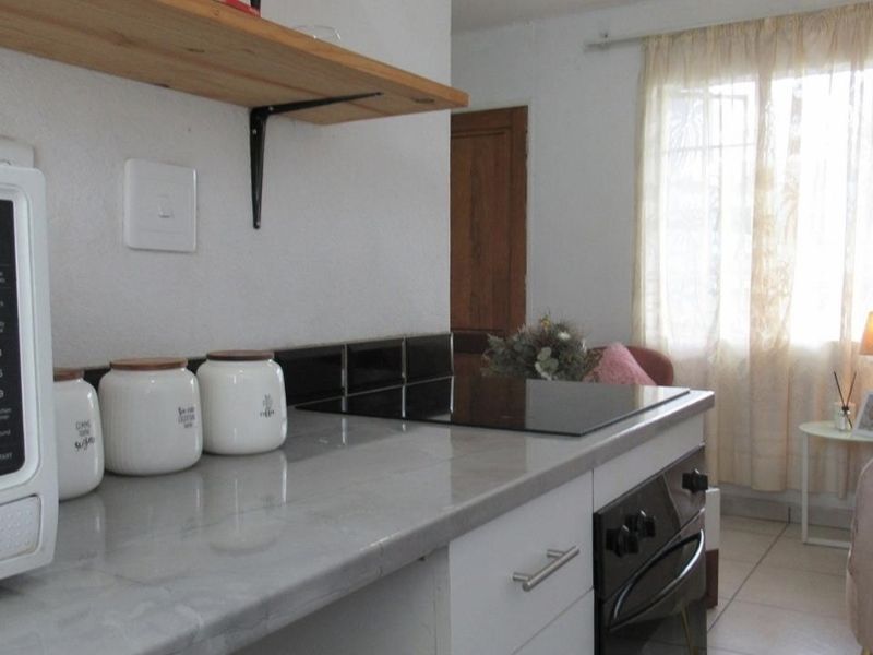 AFFORDABLE STARTER OR INVESTMENT UNIT - Photo 3