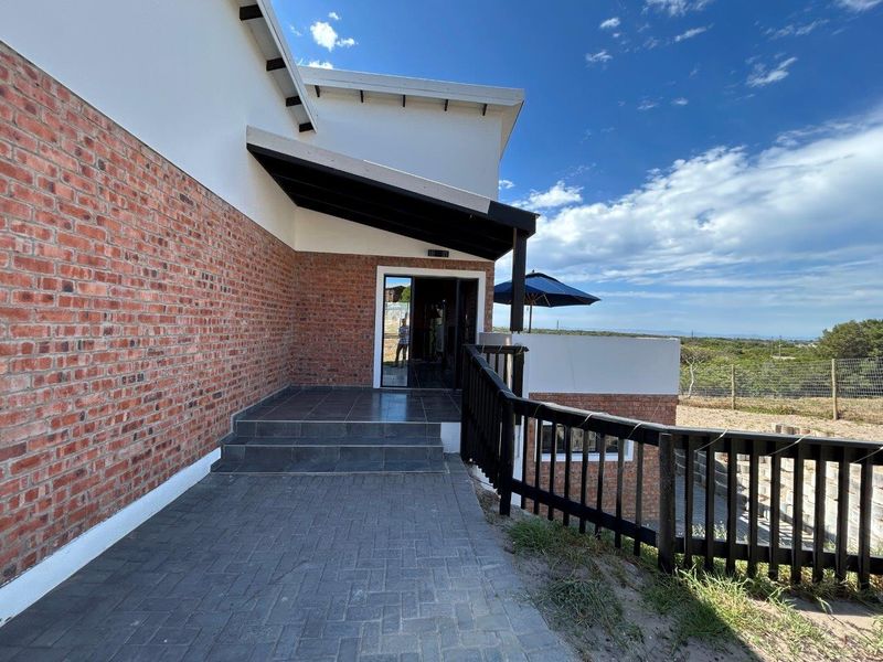 STUNNING  MODERN 3 BEDROOM HOUSE IN SOUGHT AFTER PARADISE BEACH - Photo 4