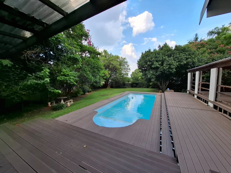 Expansive Family Home with Pool, Flat & Office for Sale in Safari Gardens Rustenburg - Photo 5