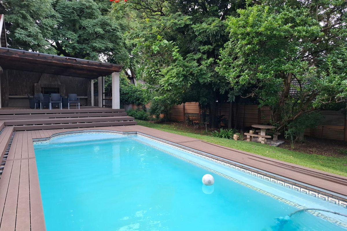 Expansive Family Home with Pool, Flat & Office for Sale in Safari Gardens Rustenburg - Photo 3