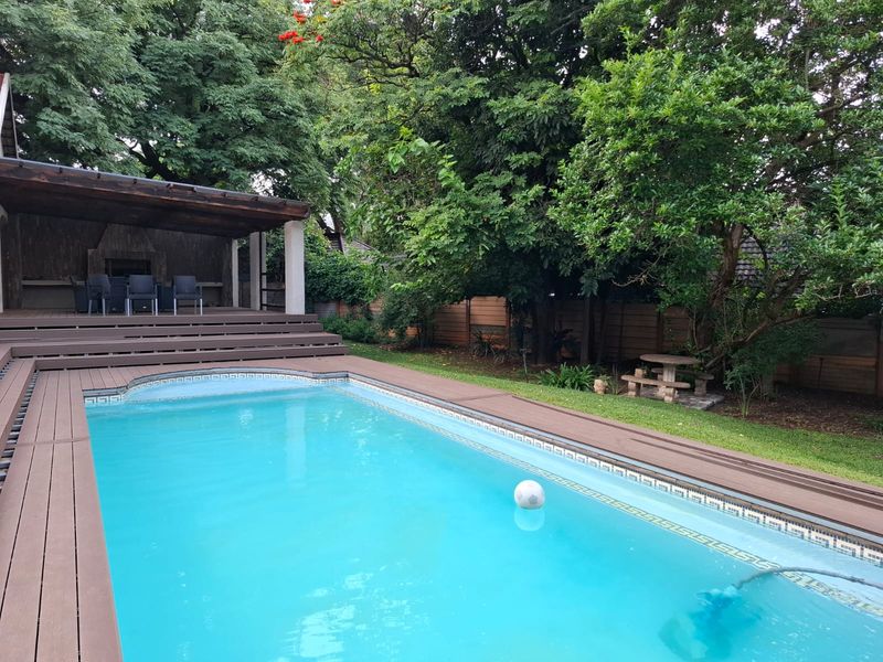 Expansive Family Home with Pool, Flat & Office for Sale in Safari Gardens Rustenburg - Photo 3
