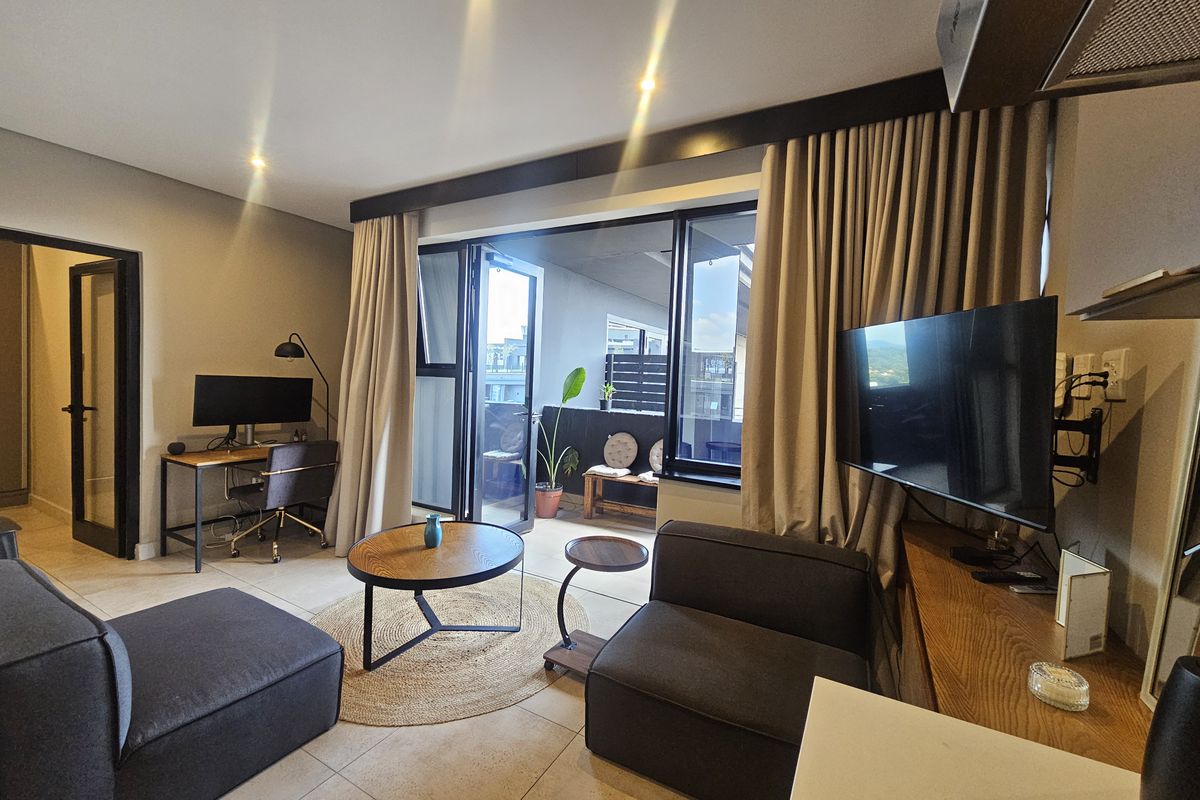 Modern One-Bedroom Fully Furnished Apartment with Sandton Skyline Views - Photo 4