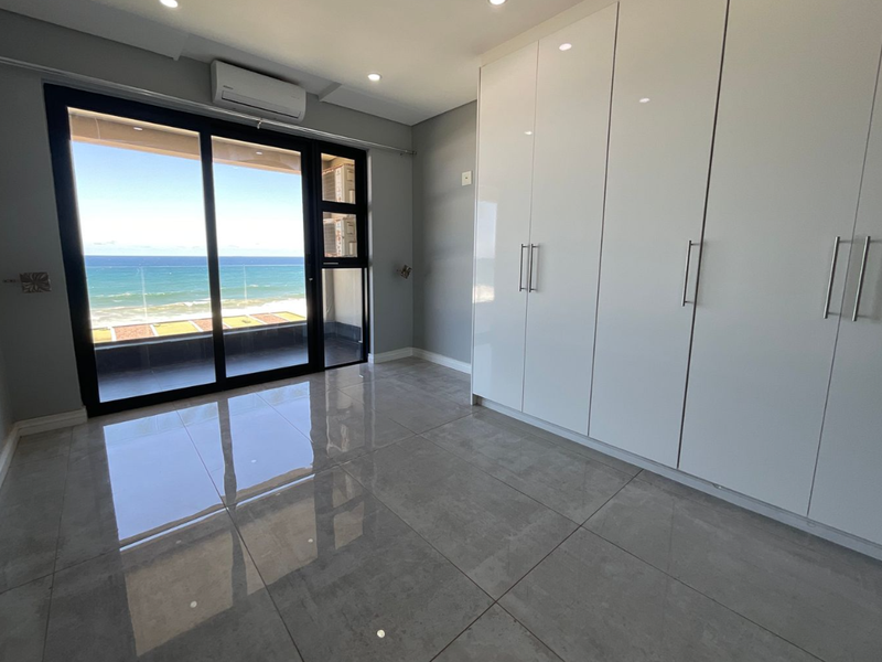 Modern Beachfront Apartment with Uninterrupted Sea Views - Excellent Investment Opportunity - Photo 7