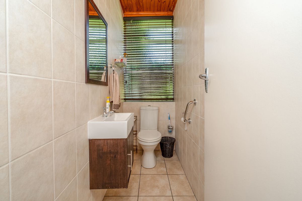 Panoramic View Home with Two Income-Producing Cottages, Solar Power & Exceptional Entertaining Space - Photo 5
