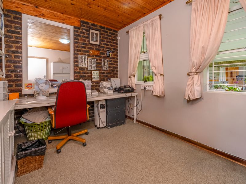 Panoramic View Home with Two Income-Producing Cottages, Solar Power & Exceptional Entertaining Space - Photo 4