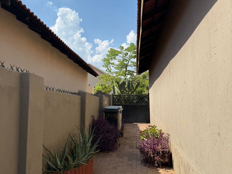 Charming 3-Bed Family Haven in Secure Melodie Estate for R2 mil - Photo 9