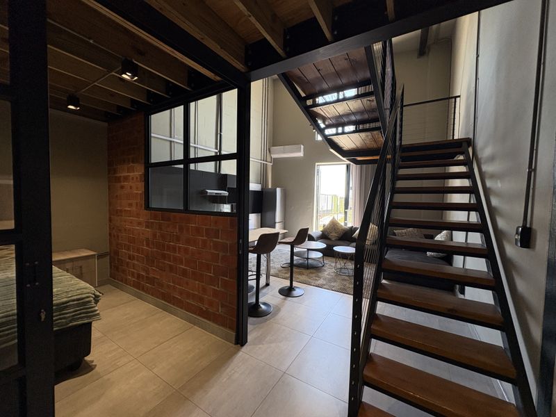 STUNNING LOFT APARTMENTS - Photo 3