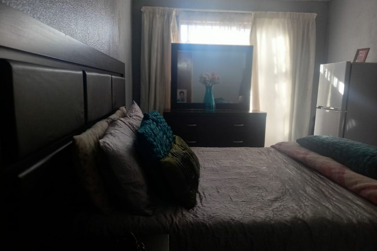 This welcoming investment property with three specious tiled bedrooms in the very big stand - Photo 3