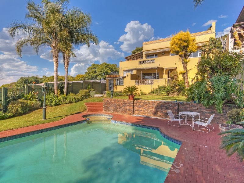 FEEL ON TOP OF THE WORLD IN THIS UNIQUE SPLIT LEVEL HOME WITH BREATHTAKING MOUNTAIN VIEWS - Photo 3