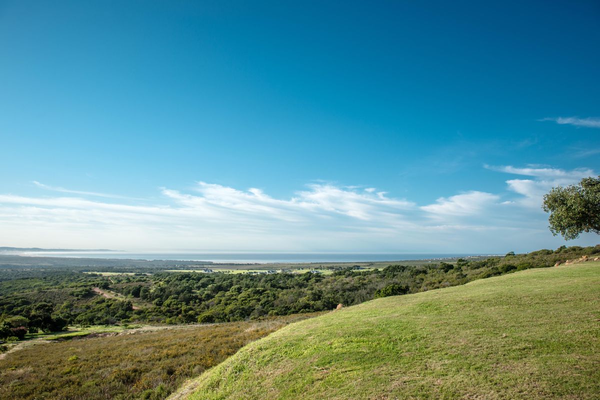 A scenic elevated view overlooking the surrounding natural landscape and distant coastline.