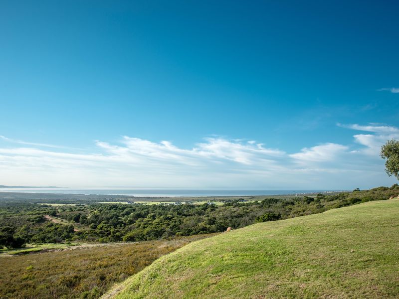 A scenic elevated view overlooking the surrounding natural landscape and distant coastline.