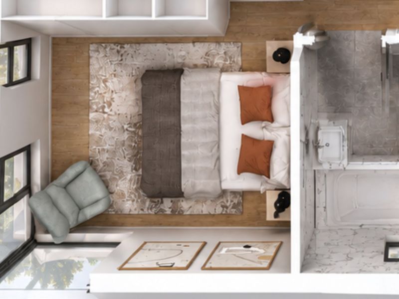 A top-down 3D floor plan rendering showing a bedroom layout with an attached bathroom featuring a bathtub, toilet, and washbasin.