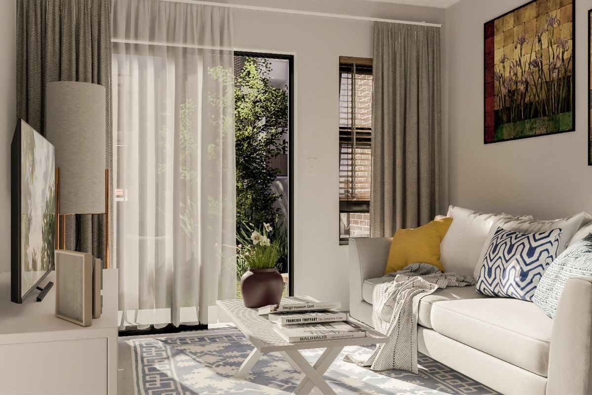 A bright and well-maintained living room featuring a large sliding glass door that provides natural light and access to the outdoor area.