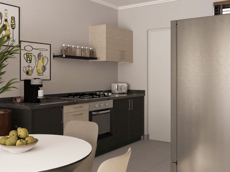 A compact, modern kitchen featuring dark and light wood-tone cabinetry, a gas cooktop, built-in oven, and neutral tiled flooring.