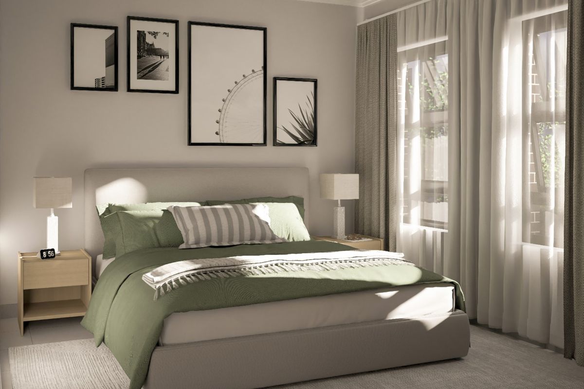 A well-lit bedroom featuring neutral wall tones, large windows with installed curtain tracks, and a clean, modern aesthetic.