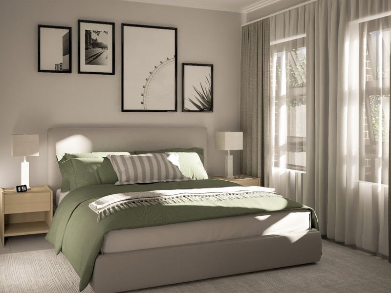 A well-lit bedroom featuring neutral wall tones, large windows with installed curtain tracks, and a clean, modern aesthetic.