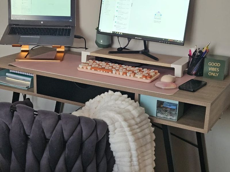 A dedicated home office workspace featuring a desk setup.