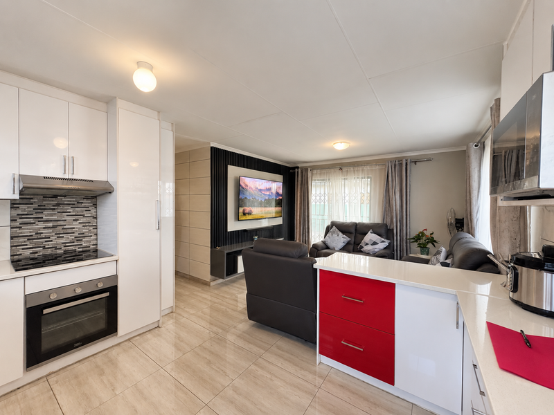 Welcome home to this modern 3-bedroom, 2-bathroom home, offering comfortable and easy living with a - Photo 4