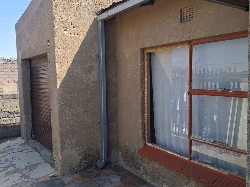 INVESTMENT PROPERTY IN TSAKANE - Photo 9