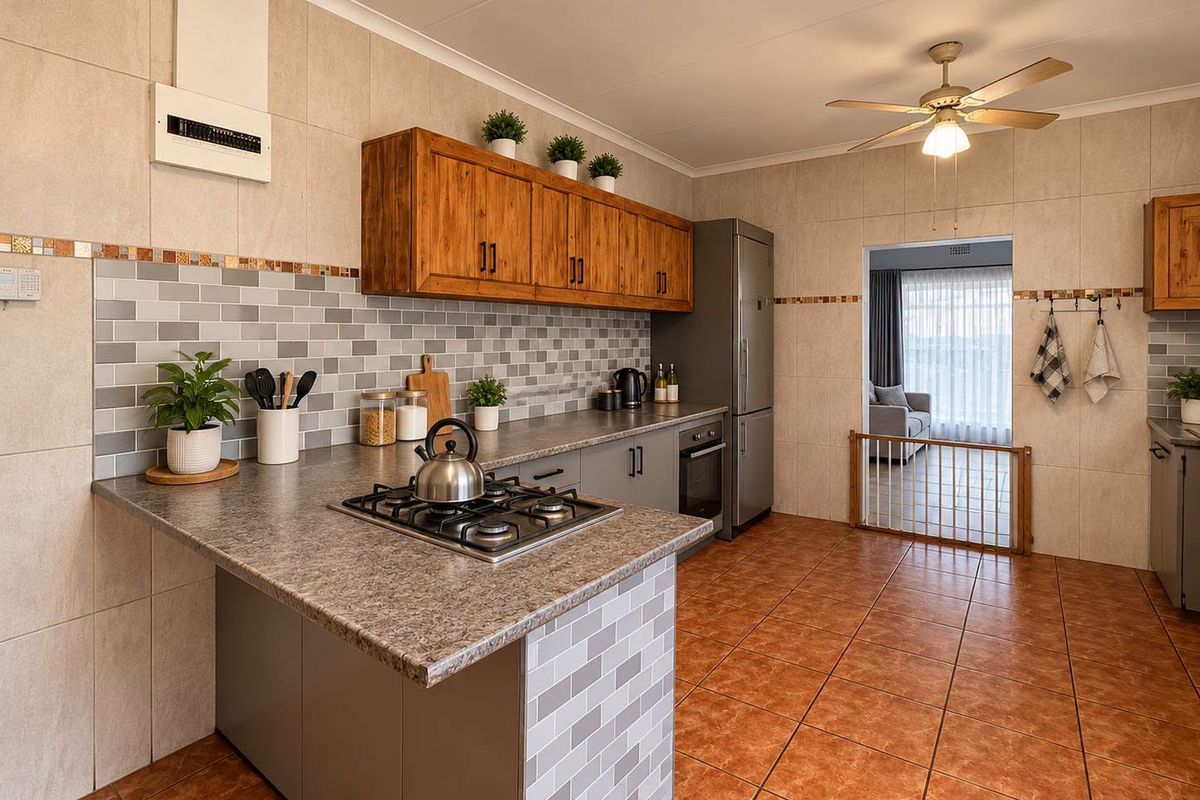 A well-maintained kitchen featuring a gas cooktop, built-in oven, tiled splashback, and ample wooden cabinetry, with a seamless flow into the adjacent living area.