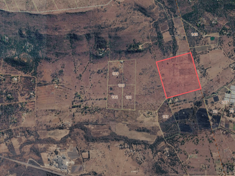 An aerial satellite view showing the property boundaries and surrounding landscape of the farm estate.