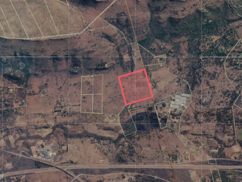 An aerial satellite view showing the property boundaries and surrounding landscape of the farm.