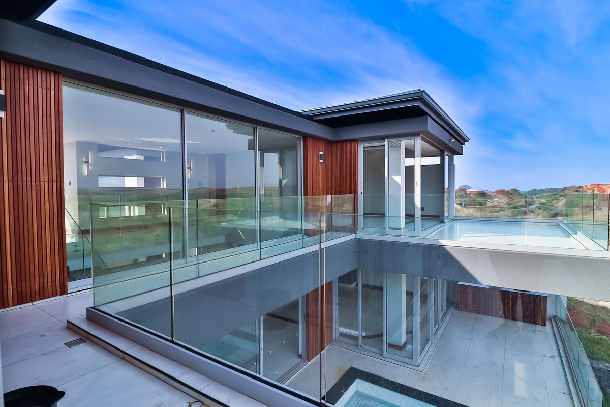 CONTEMPORARY FREESTANDING HOME – ZIMBALI LAKES ESTATE - Photo 3