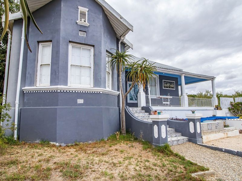 Charming Victorian-Style Home with Cottage, Borehole & Excellent Security - Photo 4