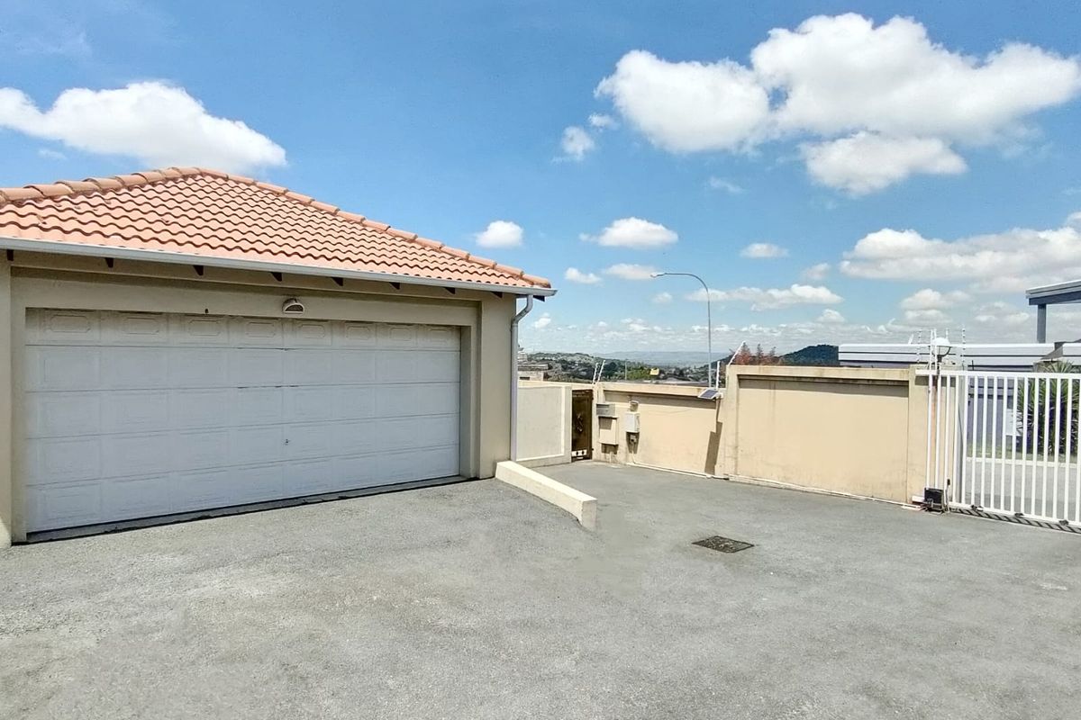 Exclusive Hillside Living – Charming Cluster in Secure Gated Community! - Photo 2