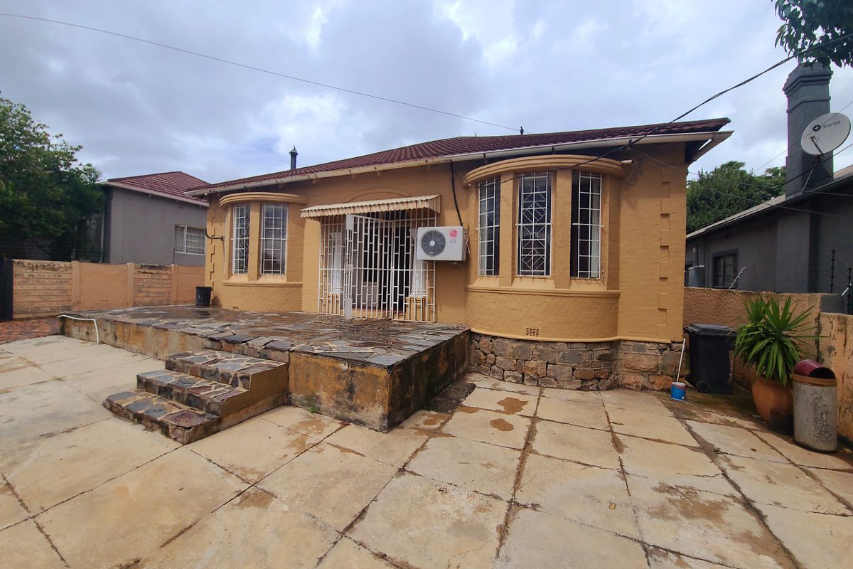 Make Your Move on This Solid Family Home with Built-In Income Potential! - Photo 2