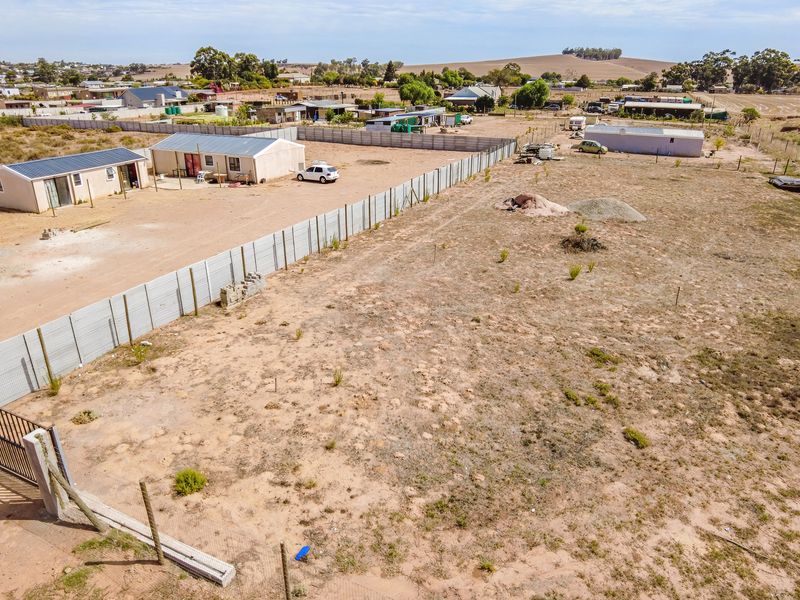 Spacious Plot with Approved Building Plans – Excellent Opportunity - Photo 4