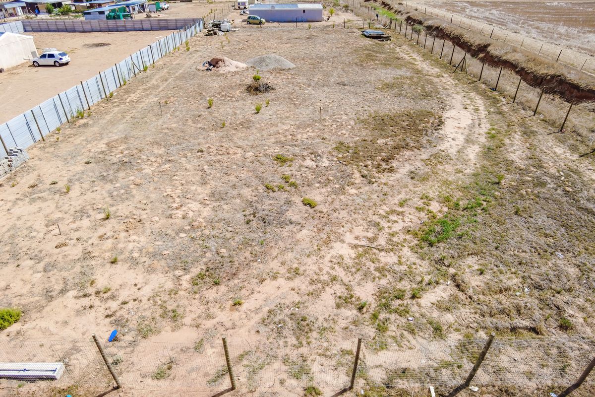 Spacious Plot with Approved Building Plans – Excellent Opportunity - Photo 3