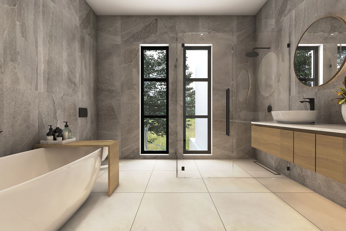 Modern luxury bathroom featuring a freestanding bathtub, walk-in shower, wall-mounted vanity with vessel sink, and elegant stone-tiled walls.