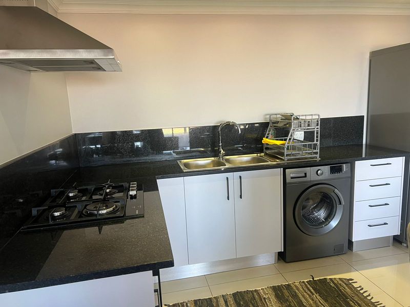 Stylish Furnished 1.5 Bedroom Apartment with Scenic Views in Secure Area - Photo 7