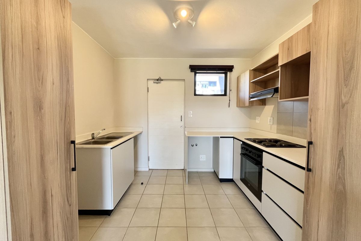 Modern 2-Bedroom Unit Available Immediately! - Photo 3