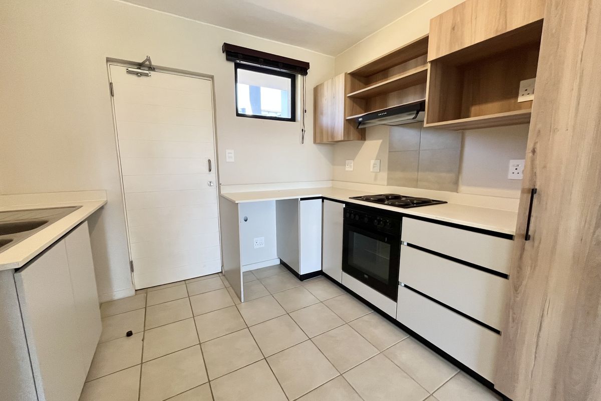 Modern 2-Bedroom Unit Available Immediately! - Photo 2