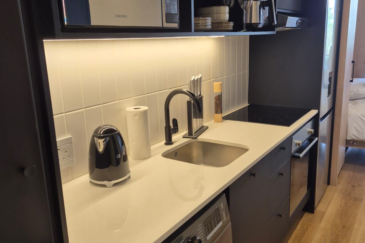 Cozy Micro Apartment At Station House - Photo 3