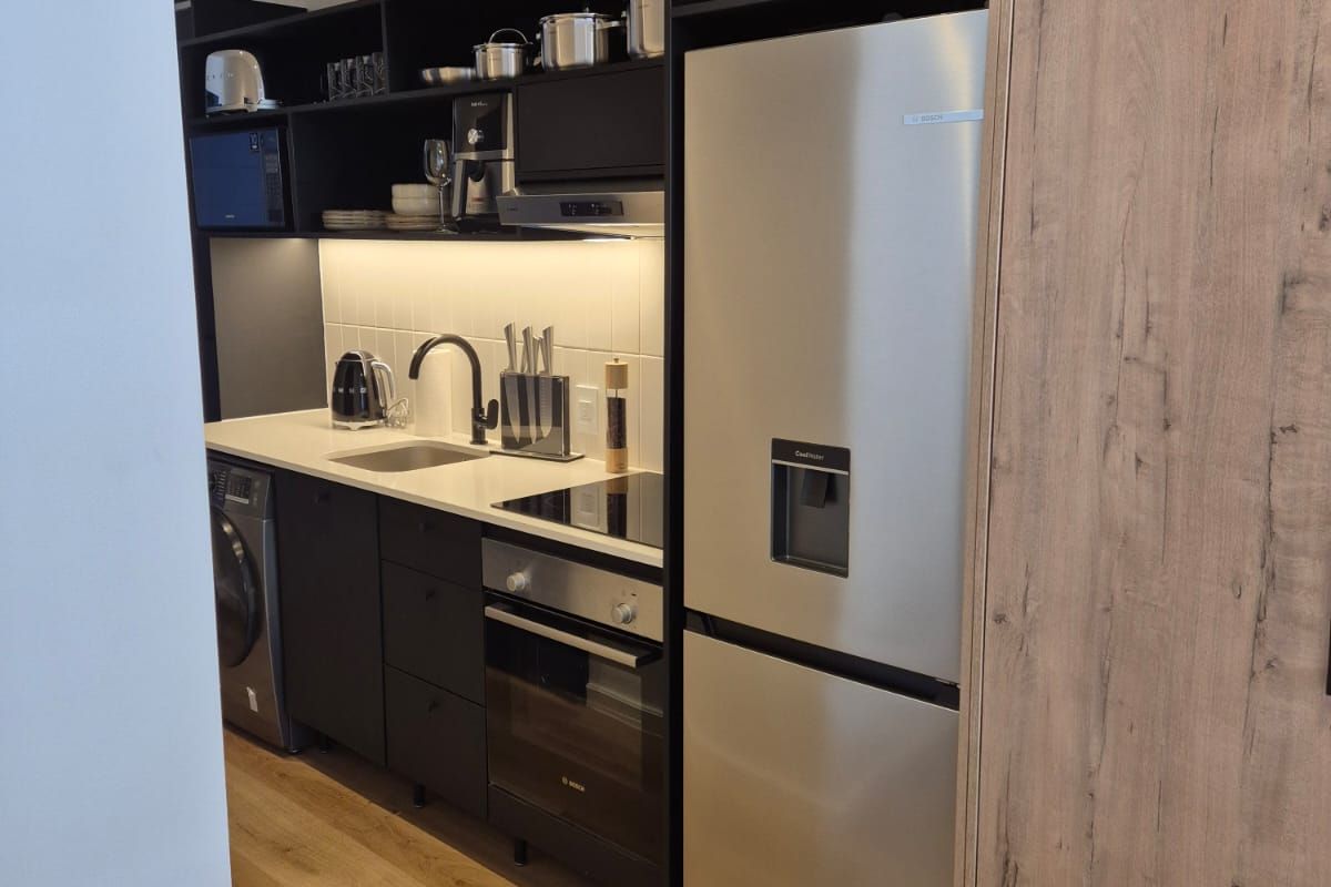 Cozy Micro Apartment At Station House - Photo 4