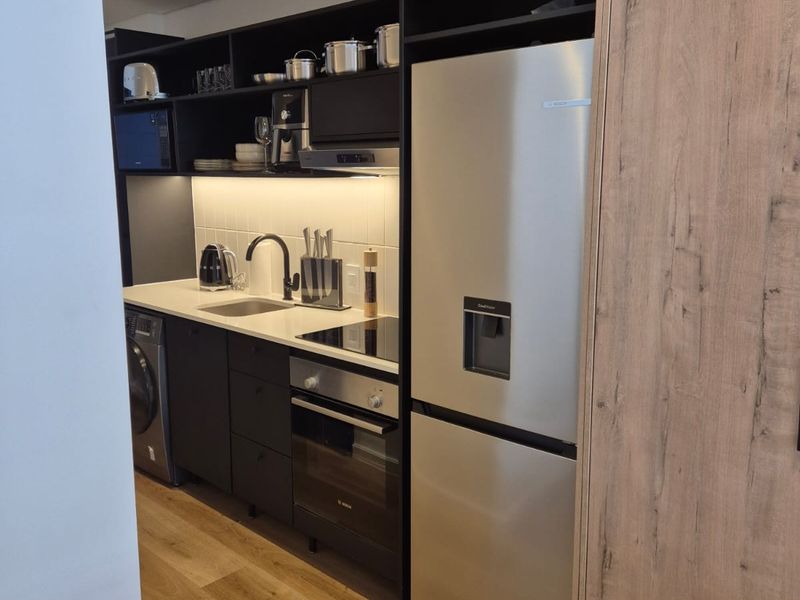 Cozy Micro Apartment At Station House - Photo 4