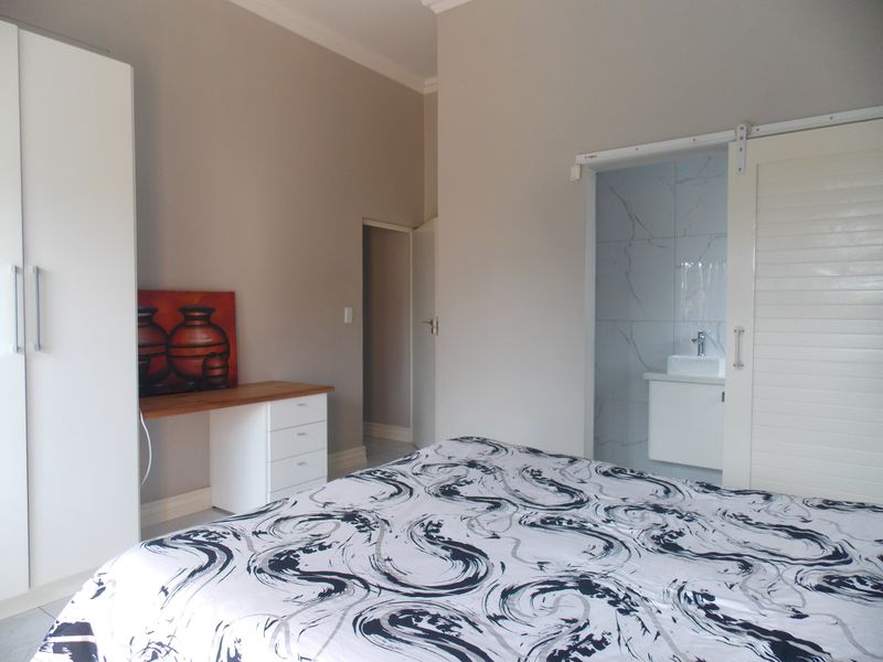 Sleek & Modern Family Living in Leloko Lifestyle Estate with Pool & Entertainer’s Patio - Photo 10