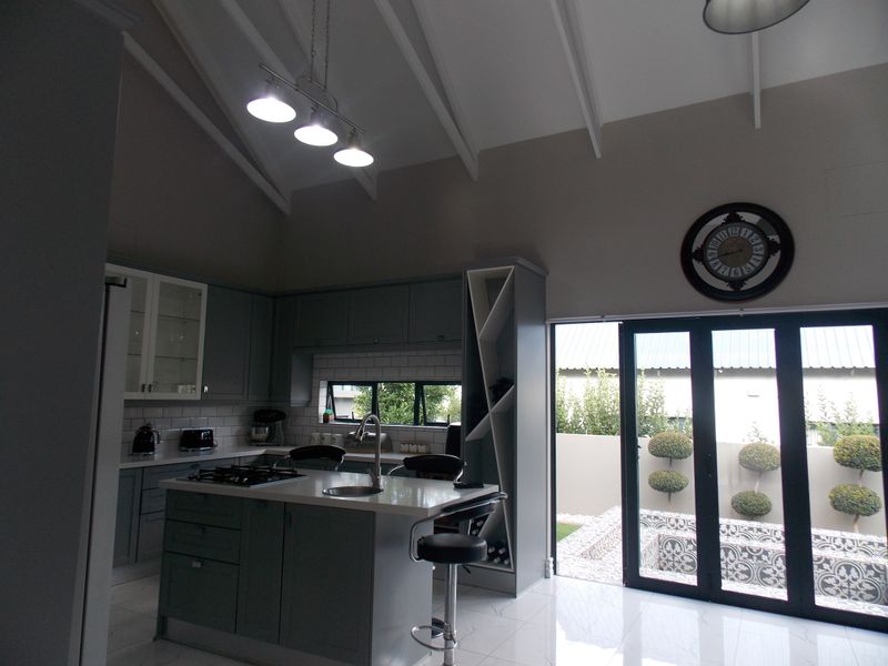 Sleek & Modern Family Living in Leloko Lifestyle Estate with Pool & Entertainer’s Patio - Photo 7