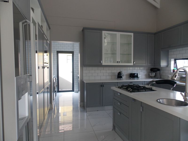 Sleek & Modern Family Living in Leloko Lifestyle Estate with Pool & Entertainer’s Patio - Photo 6