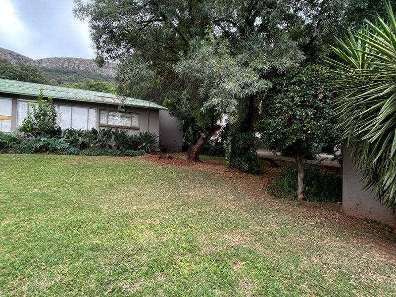 Escape to Your Private Mountain Paradise: 6.4Ha Hartbeespoort Farm with Income Goldmine! - Photo 3