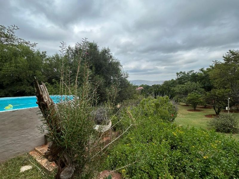 Escape to Your Private Mountain Paradise: 6.4Ha Hartbeespoort Farm with Income Goldmine! - Photo 4